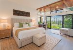 One of the most welcoming features in the master suite is the cozy seating alcove that features large wrap around windows which provide lots of warm, natural lighting, as well as expansive ocean and Molokai views